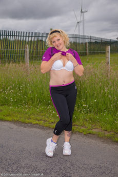 Blonde MILF Rose gets home from a jog and stretches her pussy