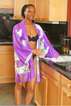 37 year old ebony chick Pepper gets naughty in the kitchen