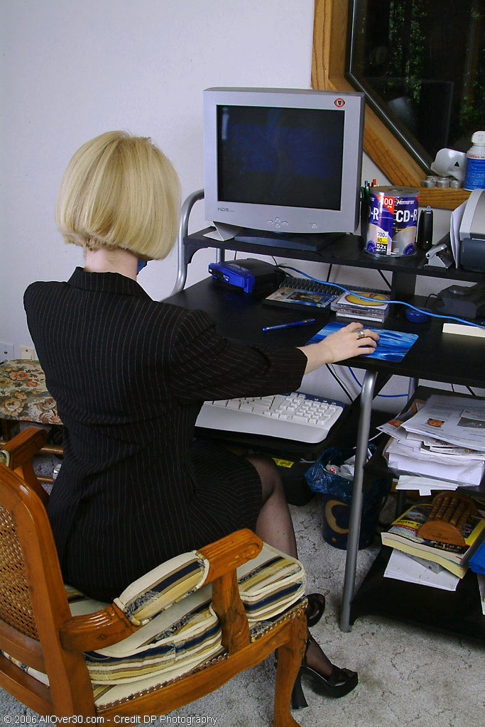 blonde-office-milf-strips-and-spreads-her-ivory-legs1.jpg