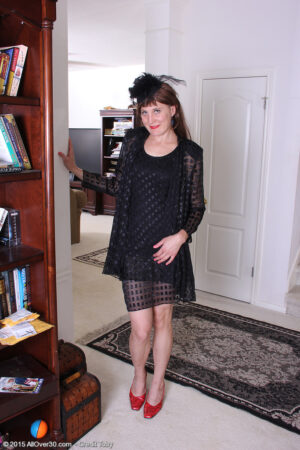 Skinny brunette Katrina Mathews takes off her dress and lets us see her hairy pussy
