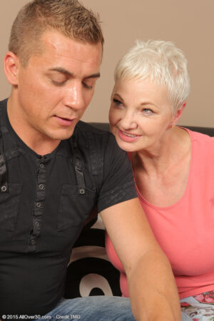 Over 60 grandma Winnie Anderson fucks a much younger man in the living room