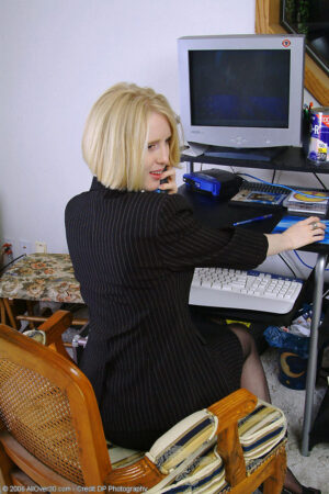 Sexy blonde MILF Lydia spreads her long legs at the office