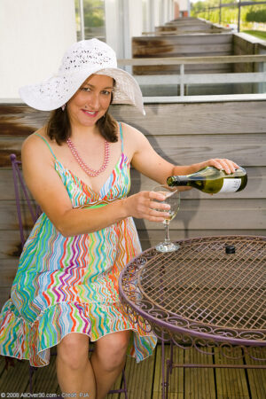 Carla’s wine goes to her head and strips on the balcony