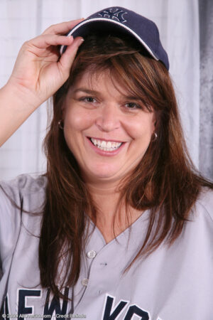 Chubby MILF Alex takes off her softball uniform and shows her bush