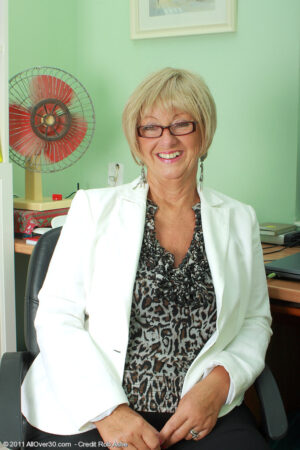 62 year old secretary Samantha T wearing glasses and spreading her pussy